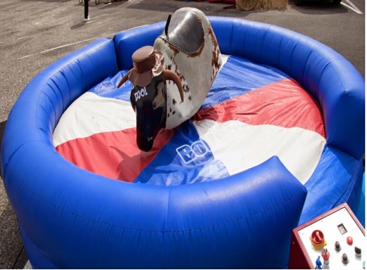 Inflatable mechanical bull rodeo